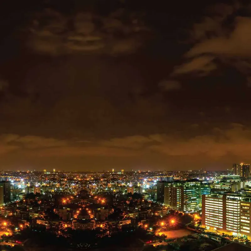 Bengaluru skyline at night, from the Adarsh Group brochure
