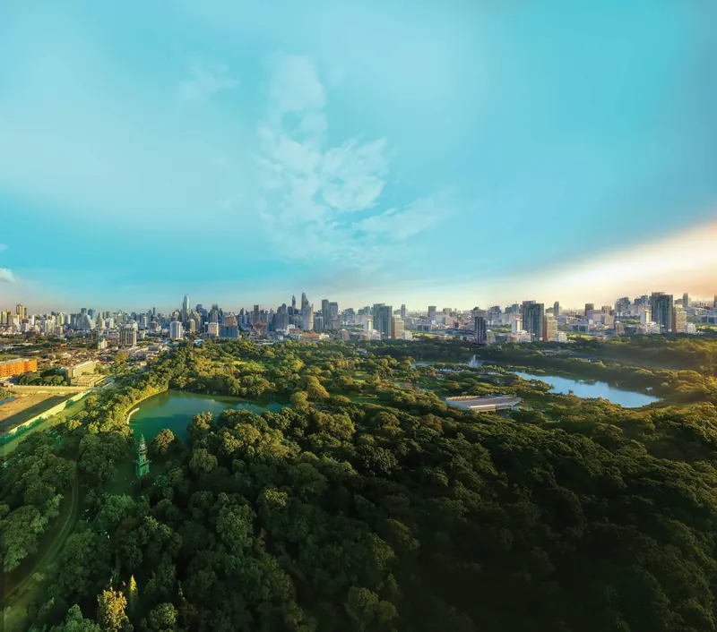 Aerial view over Gattahalli Lake and green cover towards the Bengaluru skyline