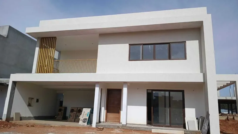 Adarsh Welkin Park Villas construction: External painting on a finished villa, August 2026